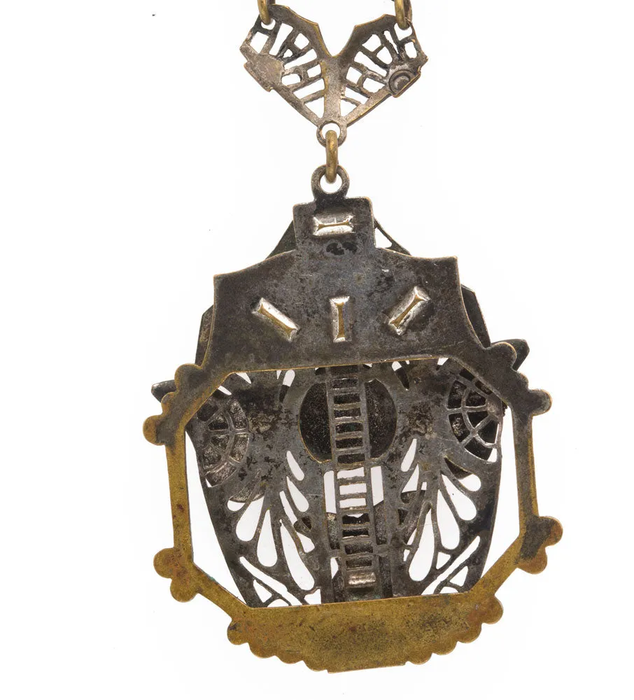 Neiger Brothers style red coral glass and brass filigree lavaliere necklace c. 1930's. j-nlbg2076