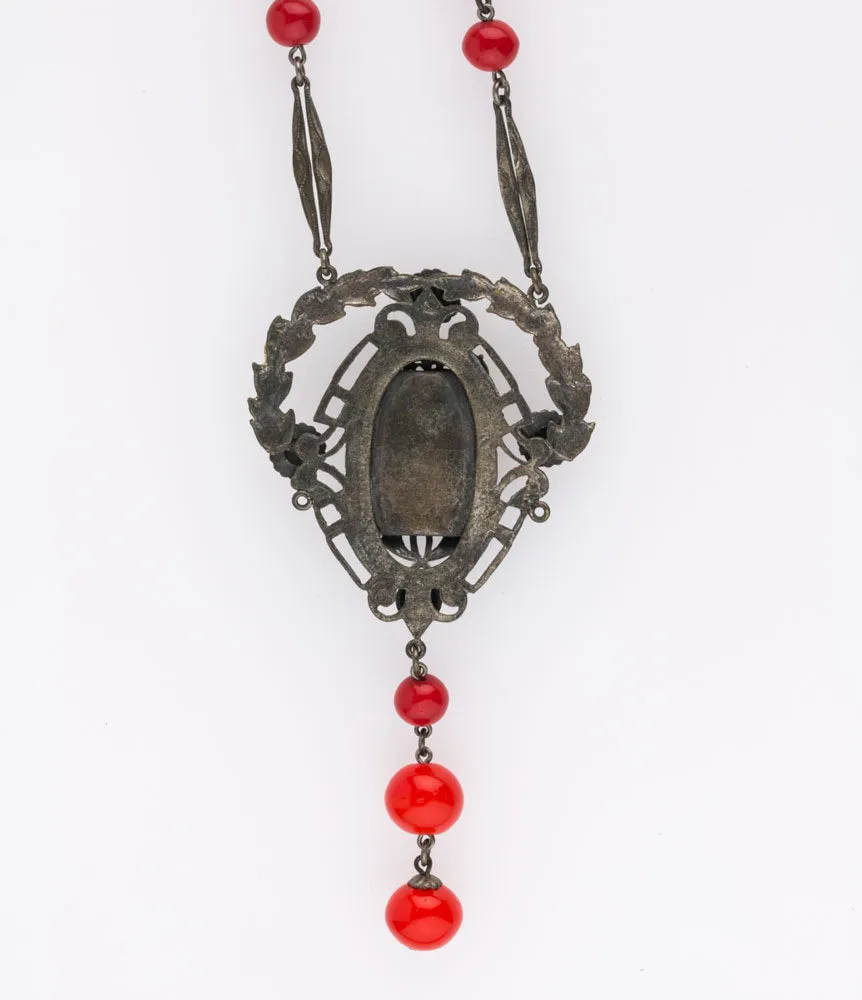 Vintage Art Deco red glass and silver metal flapper length lavaliere necklace. nlbg2109