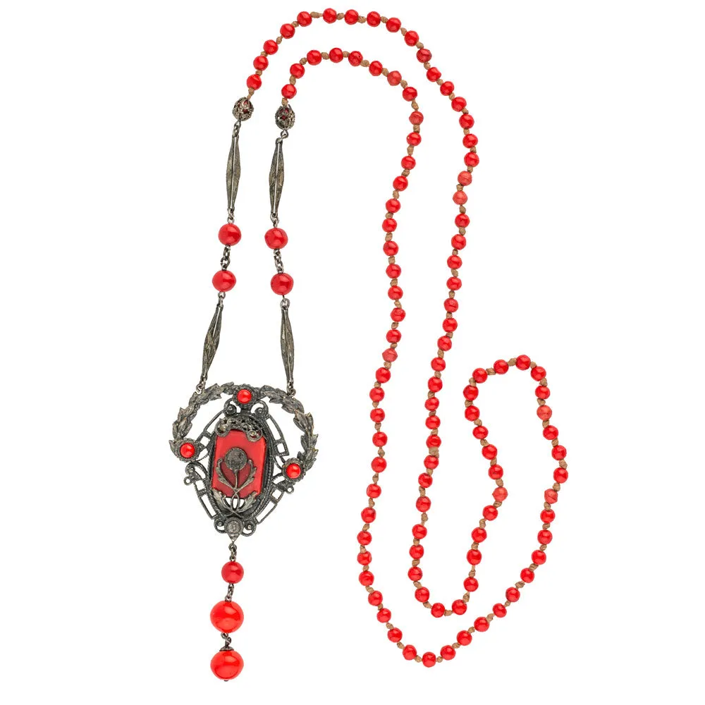Vintage Art Deco red glass and silver metal flapper length lavaliere necklace. nlbg2109
